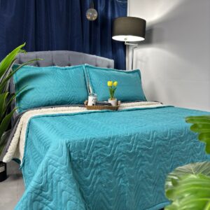 Colcha unicolor ovejera suave y cálida para cama, ideal para dormitorio moderno.