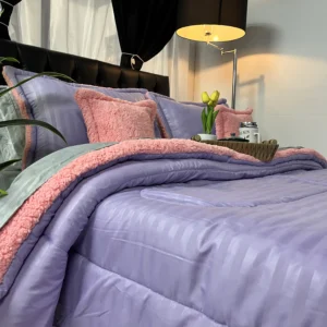 Edredón ovejero unicolor térmico con reverso de textura tipo borreguito para invierno.