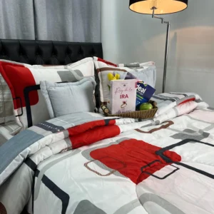Edredón estampado moderno y abrigado sobre cama doble con diseño decorativo para la habitación