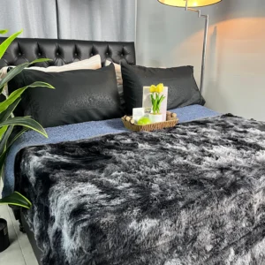 Cobija Felpa Tornasol suave y abrigada de pelo largo sobre cama doble para decoración del hogar
